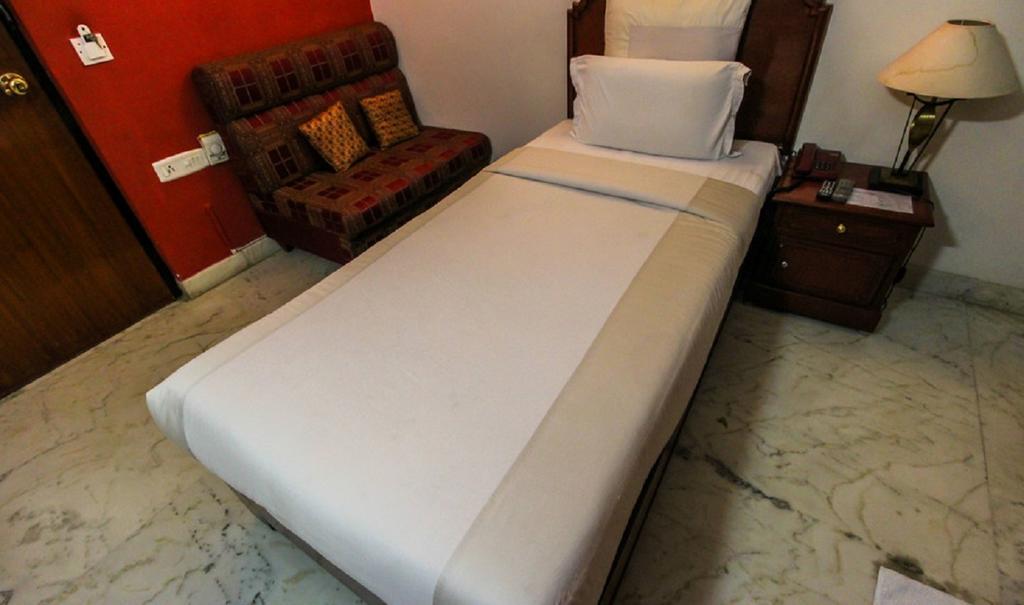 Hotel Pigeon International บังกาลอร์ ห้อง รูปภาพ
