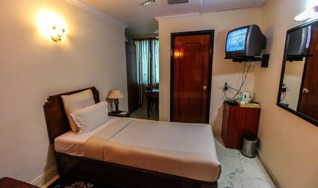 Hotel Pigeon International บังกาลอร์ ภายนอก รูปภาพ