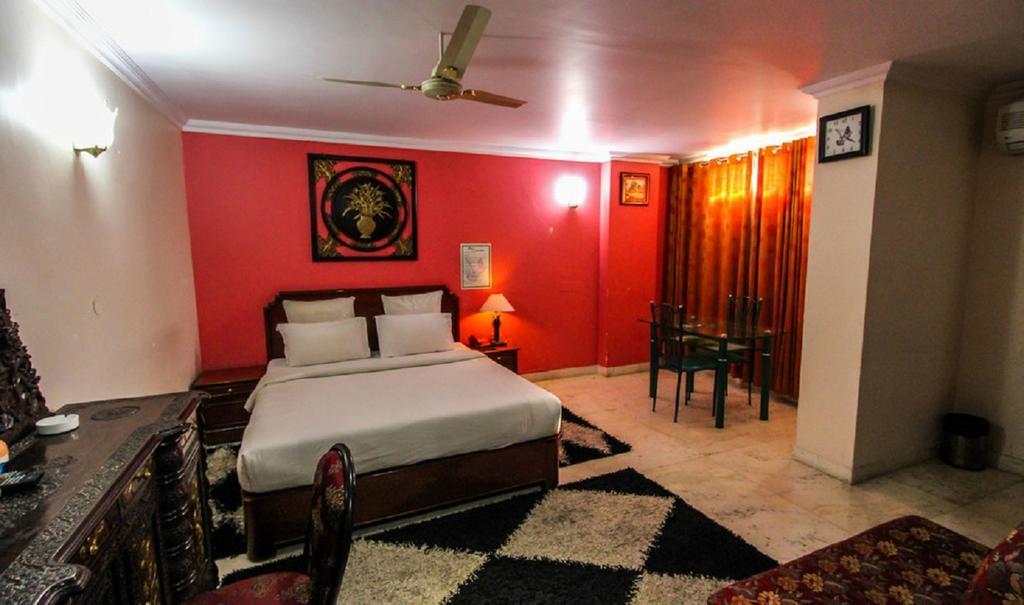 Hotel Pigeon International บังกาลอร์ ห้อง รูปภาพ