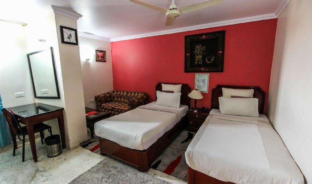 Hotel Pigeon International บังกาลอร์ ห้อง รูปภาพ