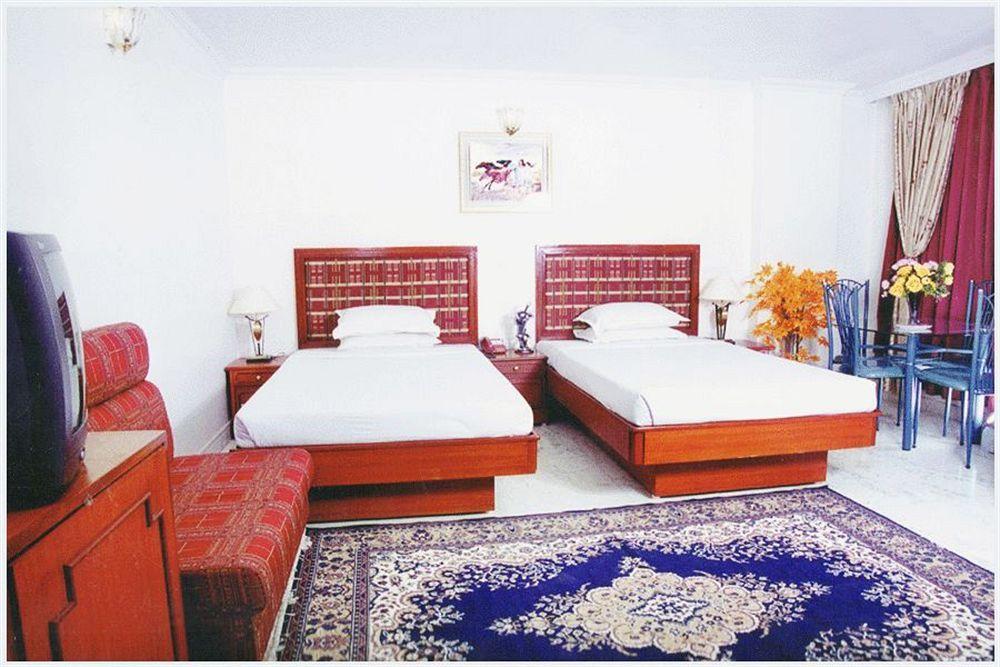 Hotel Pigeon International บังกาลอร์ ภายนอก รูปภาพ
